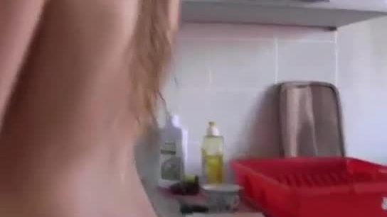 Naked girlfriend cooking
